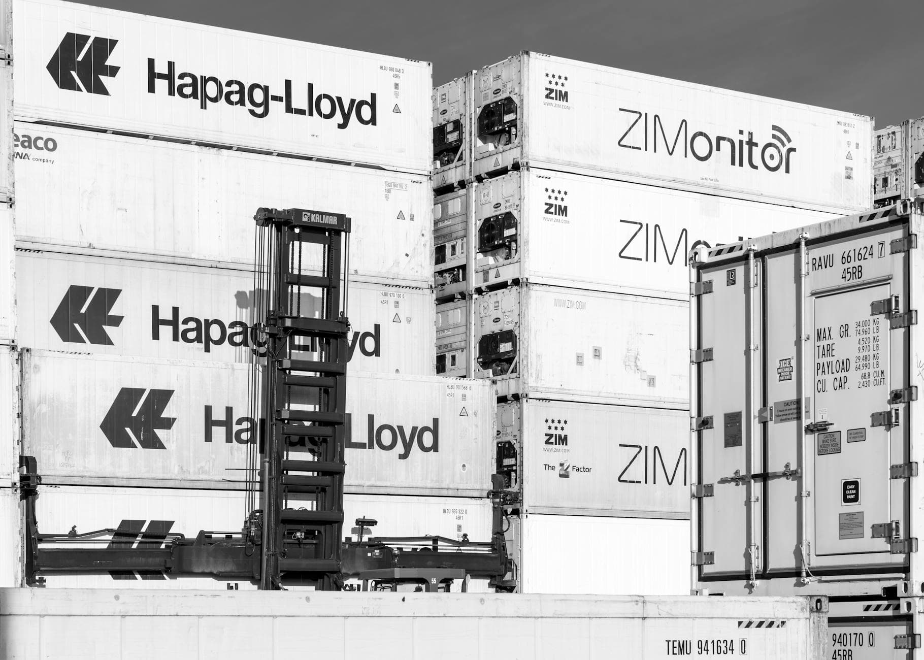 Stacked shipping containers in Hamburg, the canonical real-world example of a locked interface between independent systems